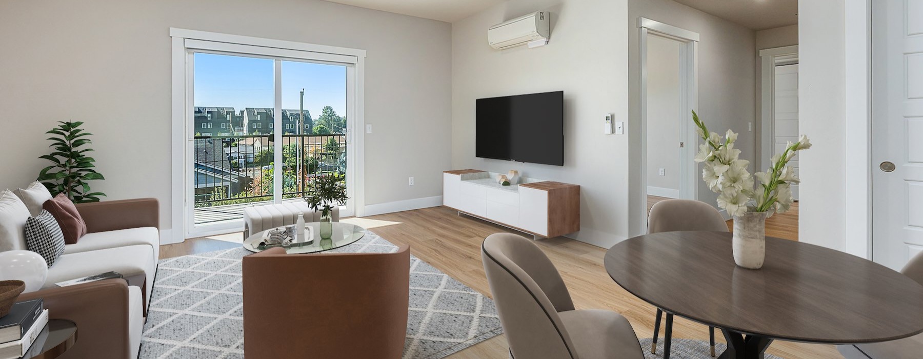 Open space living area with natural lighting at Luka in garden City, ID