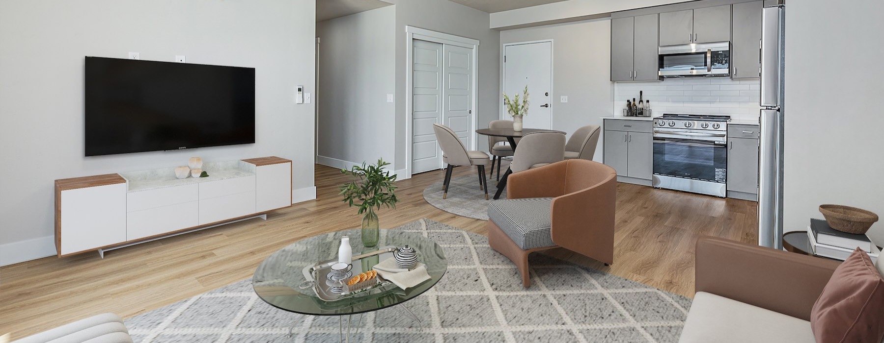 Open space living area with natural lighting at Luka in Garden City, ID